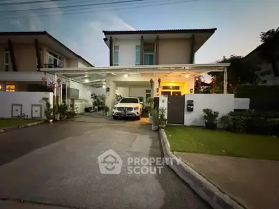 Charming suburban home with spacious driveway and modern exterior design, perfect for family living.