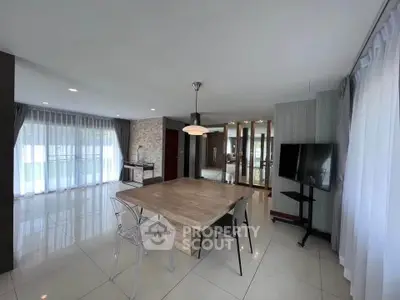 Spacious modern dining area with elegant decor and natural light