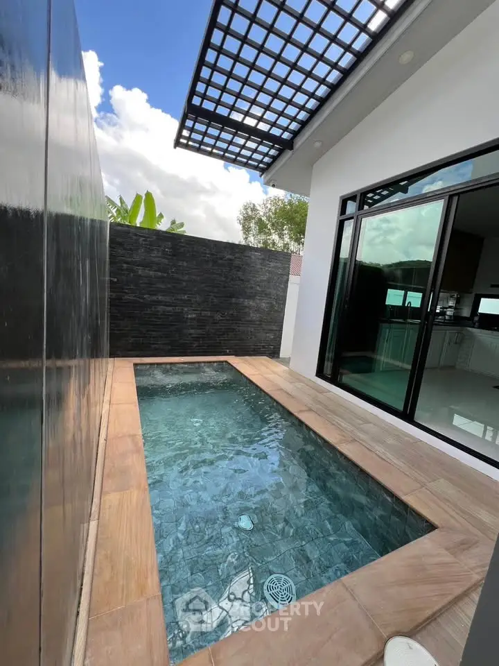 Modern home with private plunge pool and sleek design, perfect for relaxation and luxury living.