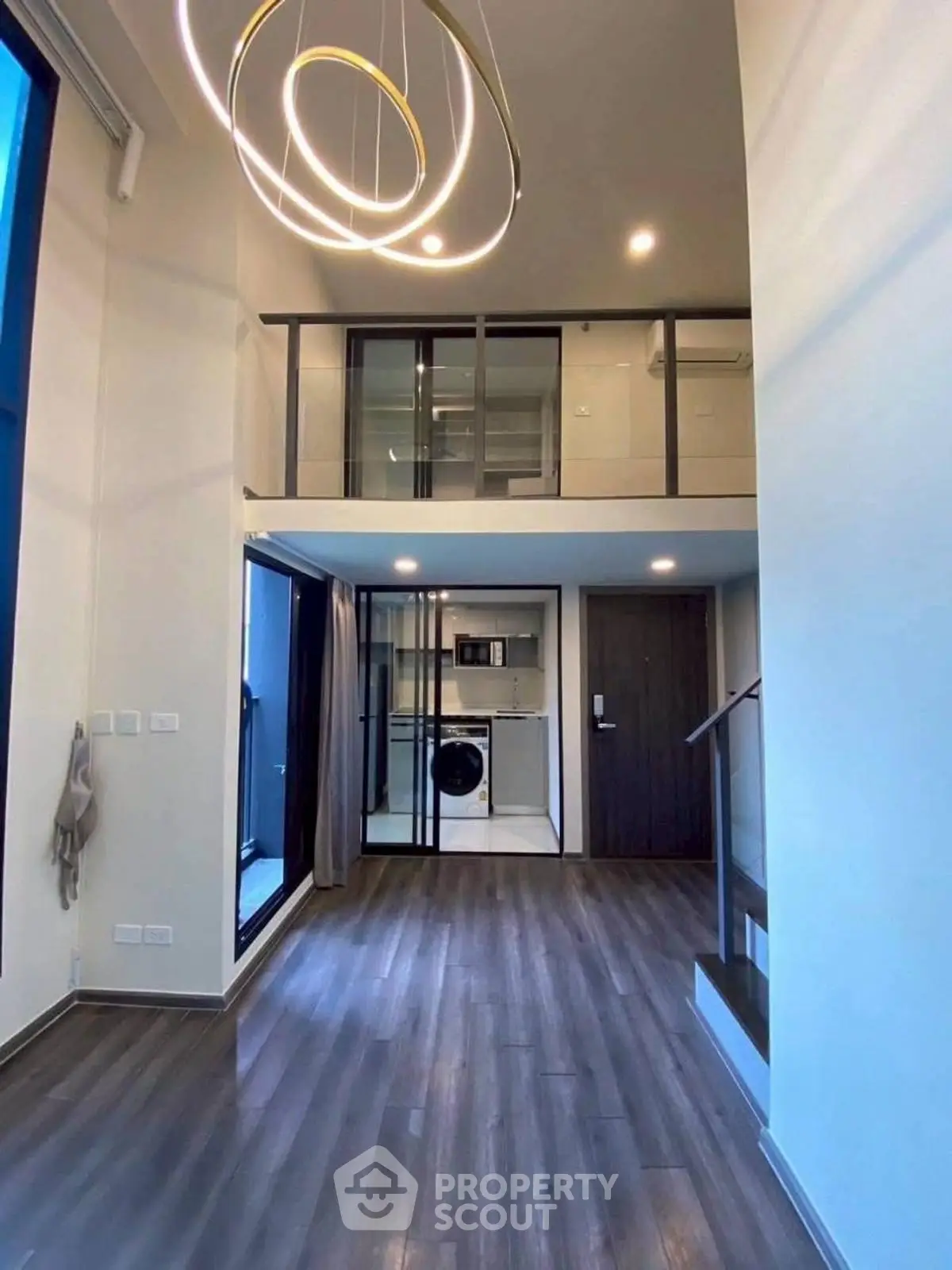 Modern loft apartment with high ceilings and stylish lighting