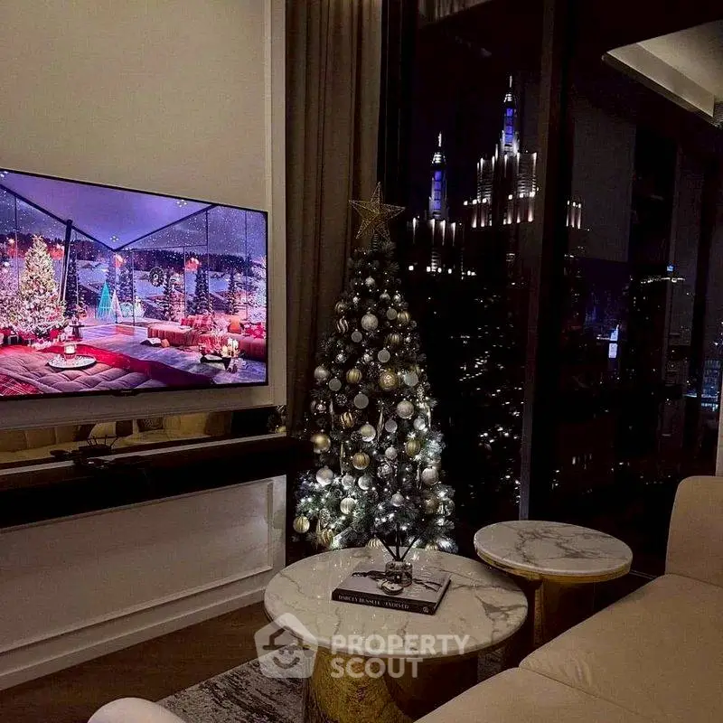 Luxurious living room with festive Christmas decor and stunning city view.