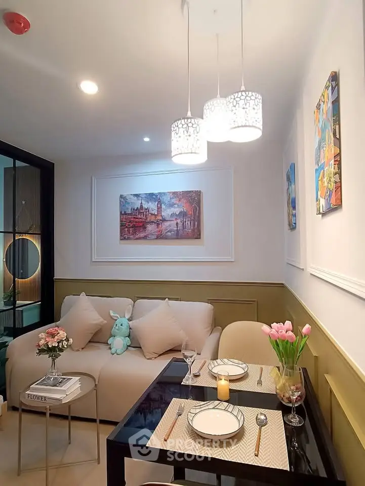 Charming living room with elegant decor and cozy dining area, perfect for modern urban living.