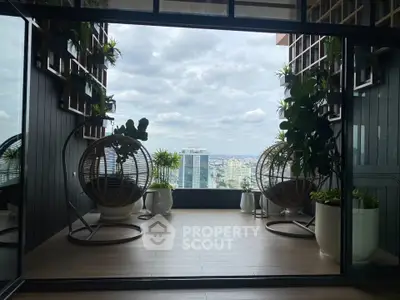 Stunning balcony with panoramic city view and lush greenery