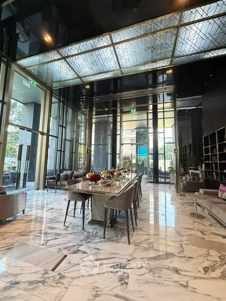 Luxurious building lobby with elegant marble flooring and modern furnishings