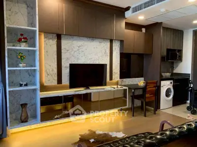 Modern living room with marble accents and built-in TV unit
