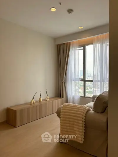 Cozy living room with city view and elegant decor