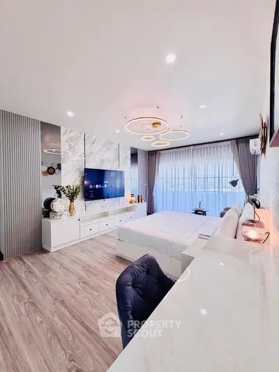 Luxurious modern bedroom with elegant decor and large windows