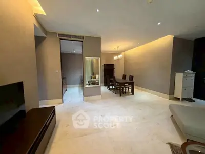 Spacious modern living room with elegant dining area and neutral tones