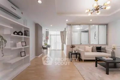 Spacious modern living room with elegant decor and natural light