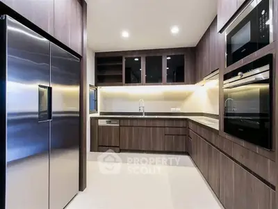 Modern kitchen with sleek cabinetry and stainless steel appliances