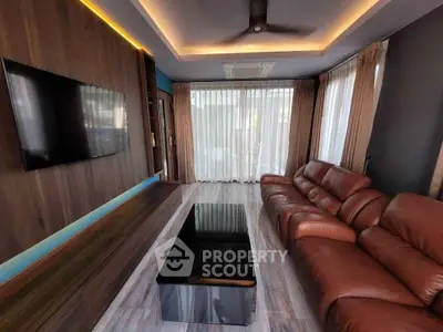 Luxurious living room with leather sofa and modern decor