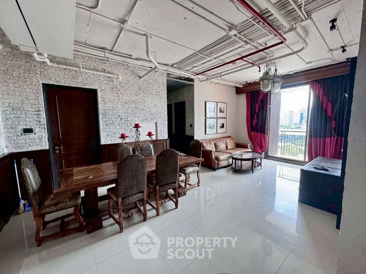 Spacious living room with elegant dining area and city view, featuring modern decor and large windows.