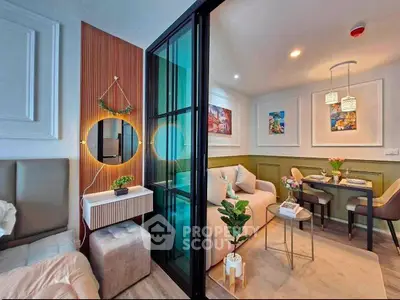 Modern living room with stylish decor and dining area in open layout apartment.