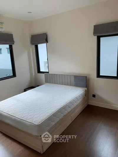 Modern bedroom with minimalist design and natural light