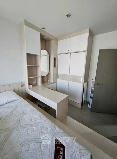 Modern bedroom with built-in wardrobe and stylish decor