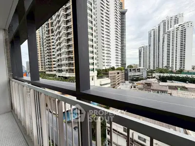 Stunning urban balcony view with modern high-rise buildings and cityscape.