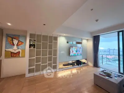 Spacious living room with modern decor and city view balcony