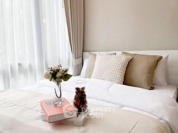 Cozy bedroom with elegant decor and natural light