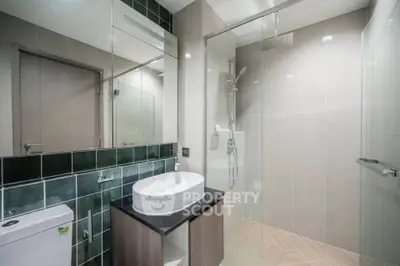 Modern bathroom with sleek design and glass shower enclosure