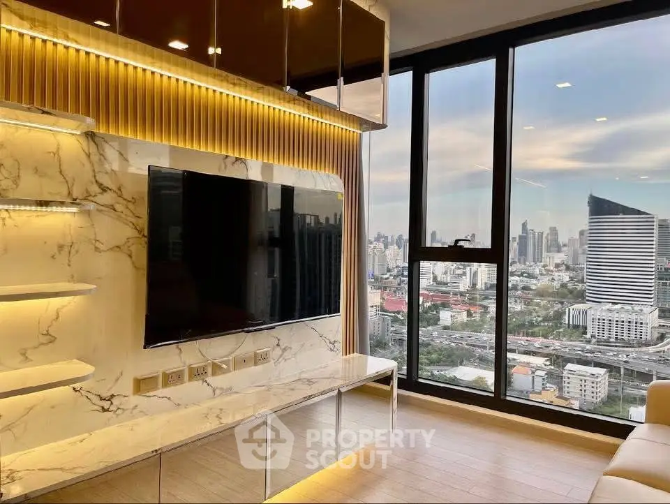 Luxurious living room with stunning city view and modern marble TV wall