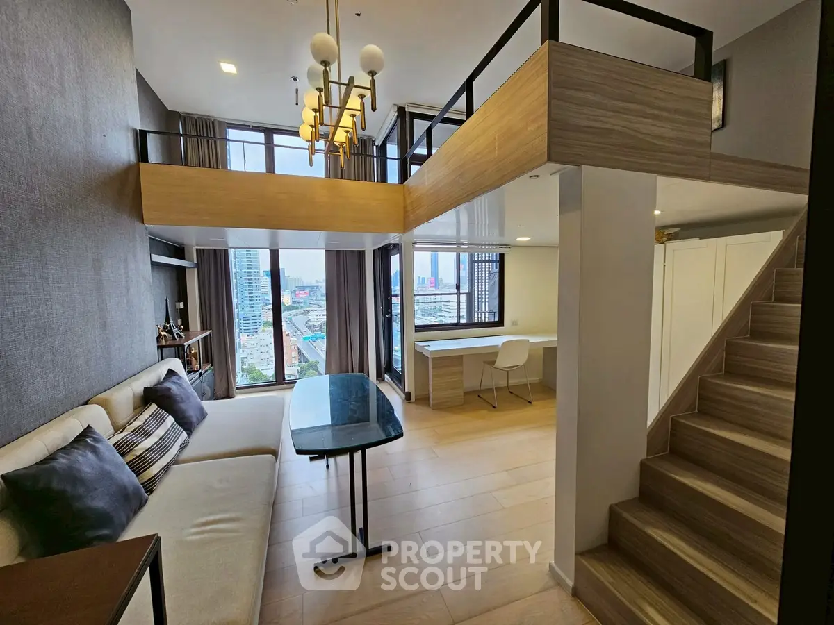 Modern loft-style living room with mezzanine and city view