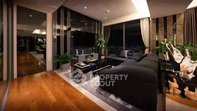 Luxurious modern living room with city view, elegant decor, and spacious seating area.