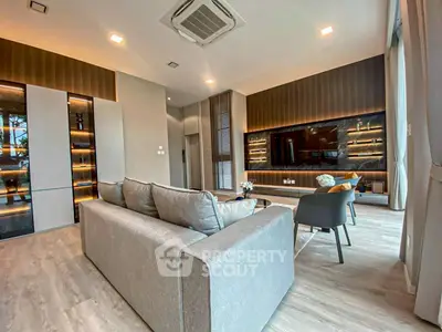 Luxurious modern living room with elegant decor and ambient lighting
