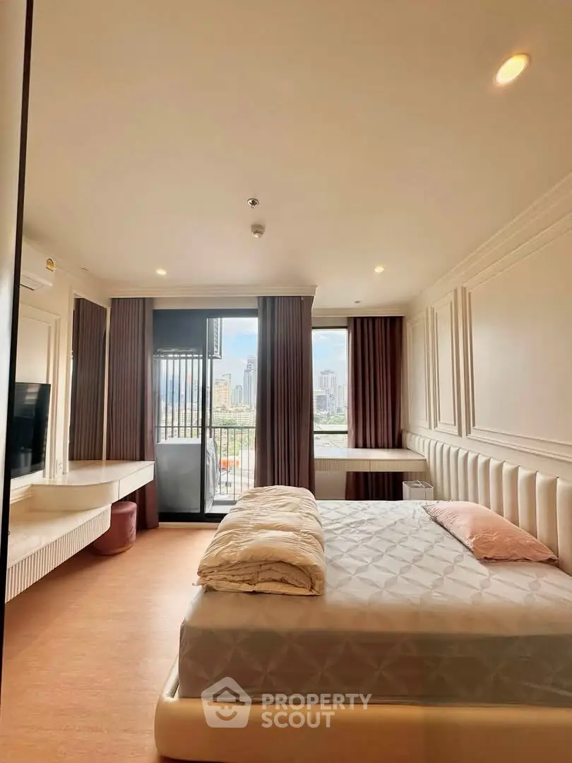 Luxurious bedroom with city view and elegant decor in modern apartment