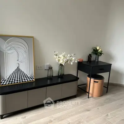 Stylish modern living room corner with elegant decor and sleek furniture