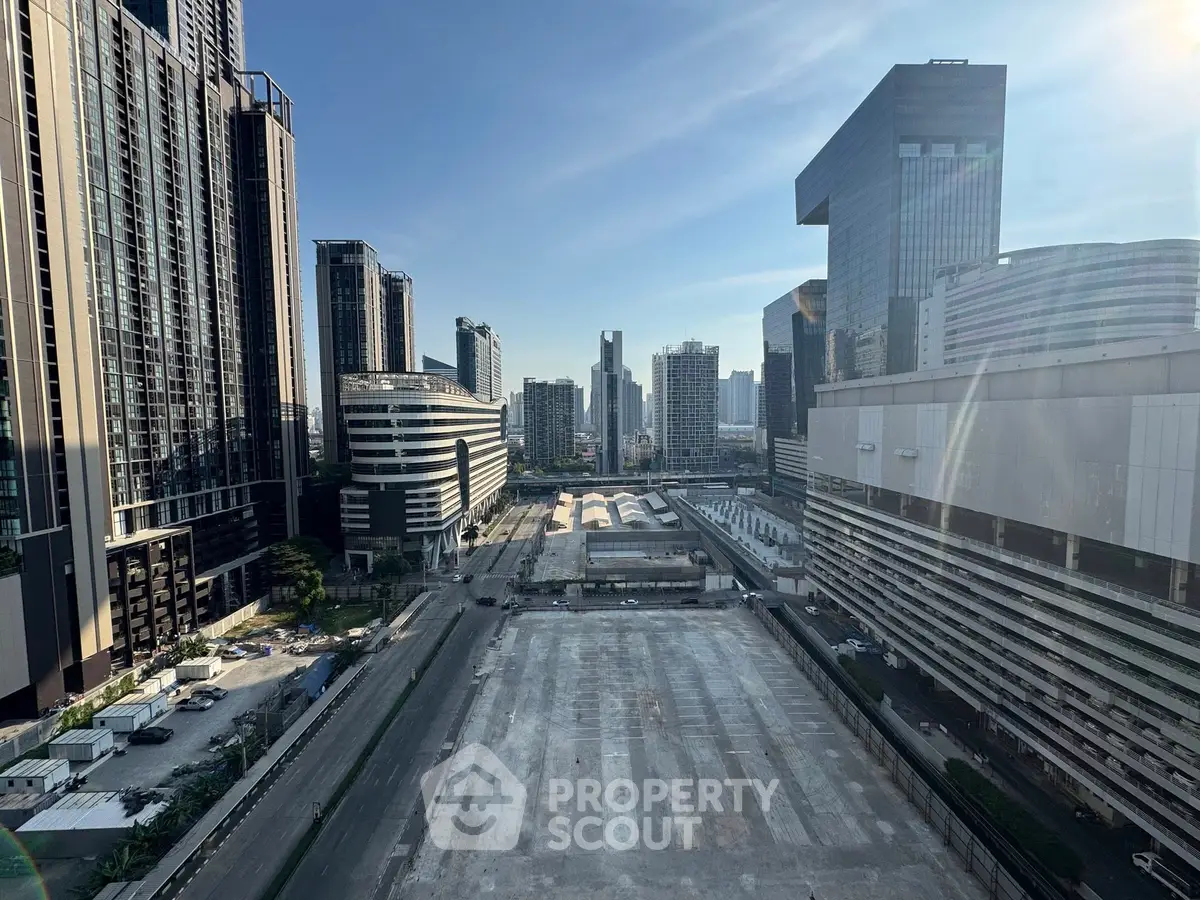 Stunning urban skyline view with modern high-rise buildings and clear blue sky.