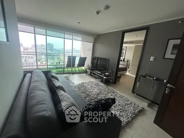 Modern living room with city view and stylish decor in urban apartment