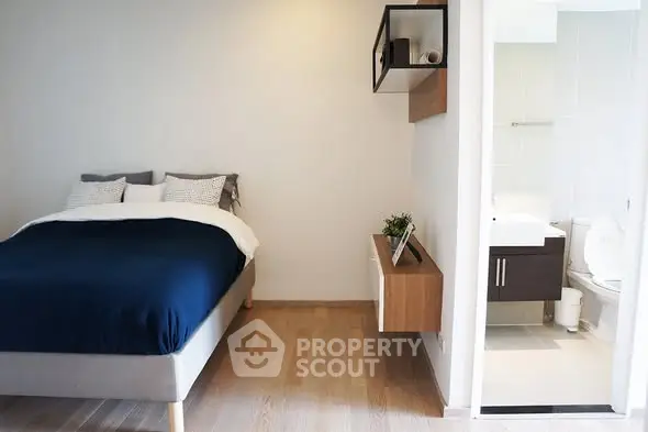 Modern bedroom with ensuite bathroom and stylish decor