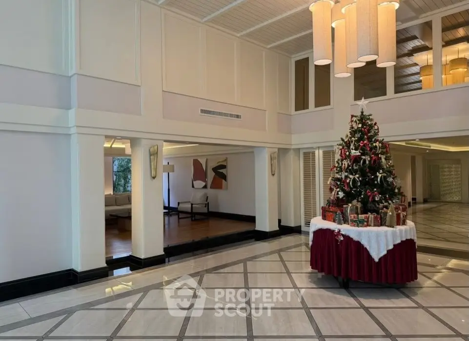 Elegant building lobby with festive Christmas tree and modern decor