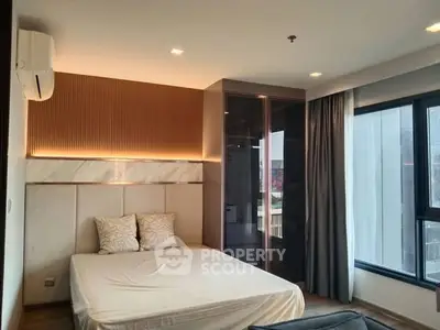 Modern bedroom with large windows and stylish decor