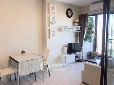 Bright modern living room with balcony and stylish decor