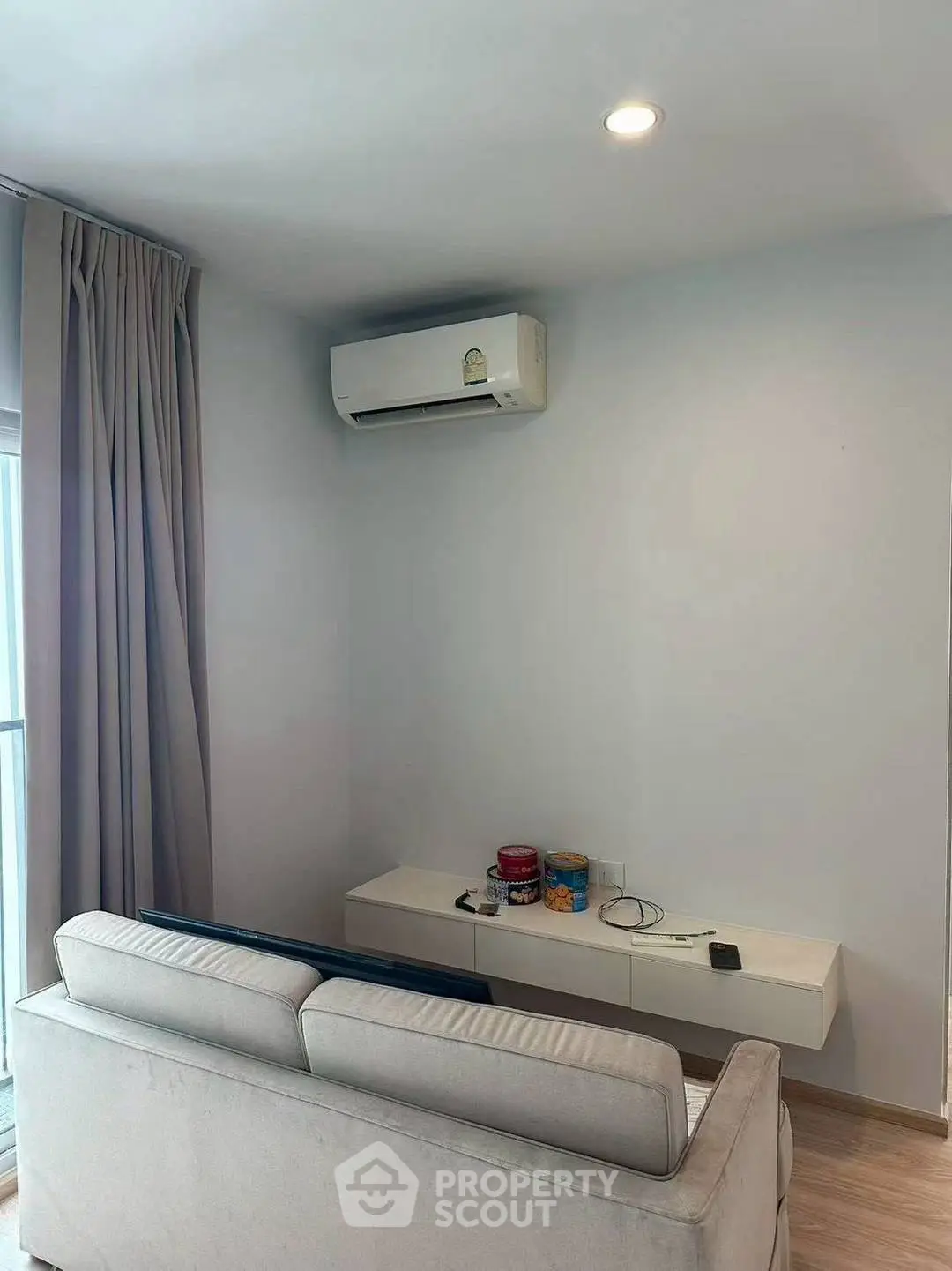 Modern living room with air conditioning and minimalist decor