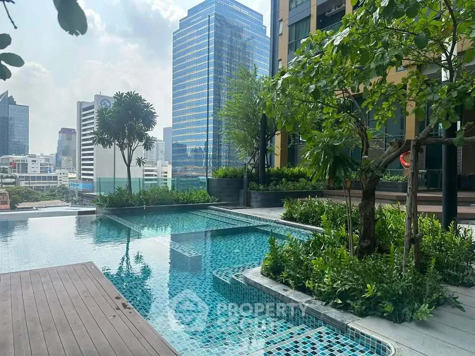 Luxurious rooftop pool with stunning city skyline view and lush greenery