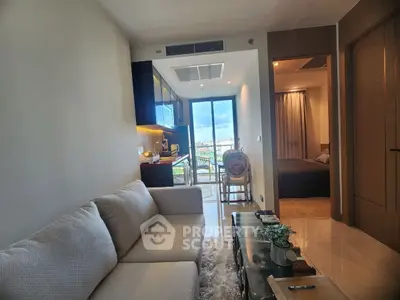 Modern living room with cozy sofa and balcony view in stylish apartment