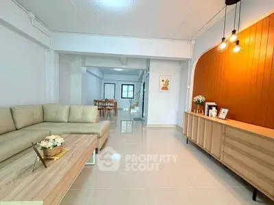 Spacious modern living room with elegant decor and ample natural light