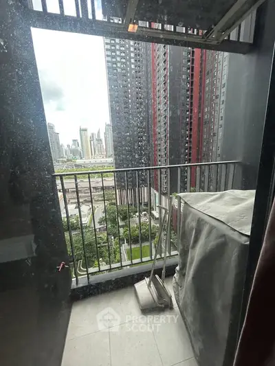 Urban balcony with city skyline view, perfect for enjoying the vibrant cityscape.