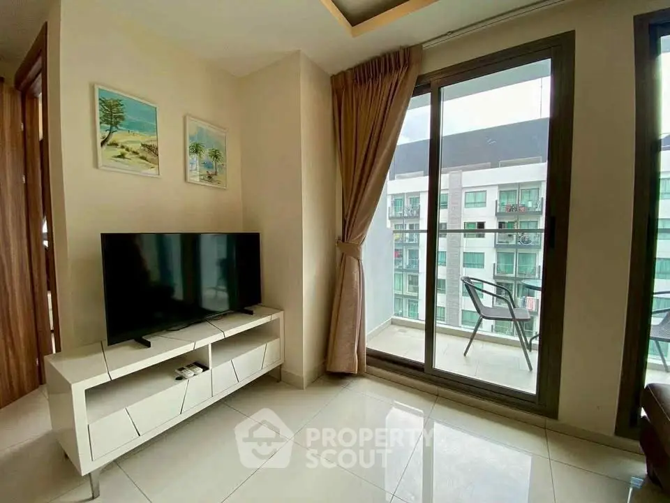Modern living room with balcony view in high-rise apartment