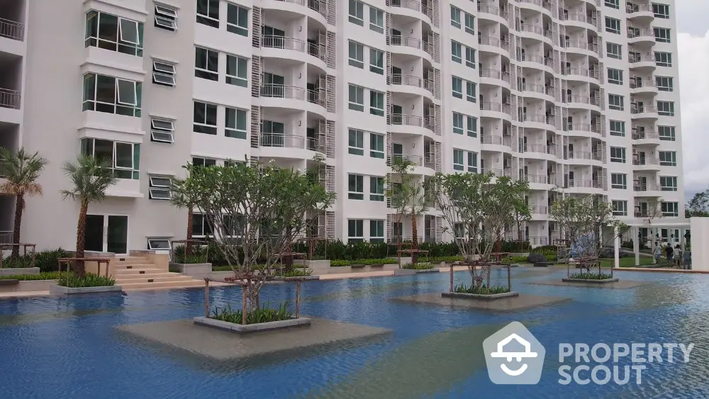 Modern condominium with luxurious pool and landscaped garden