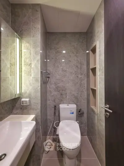 Modern bathroom with sleek design and elegant marble tiles