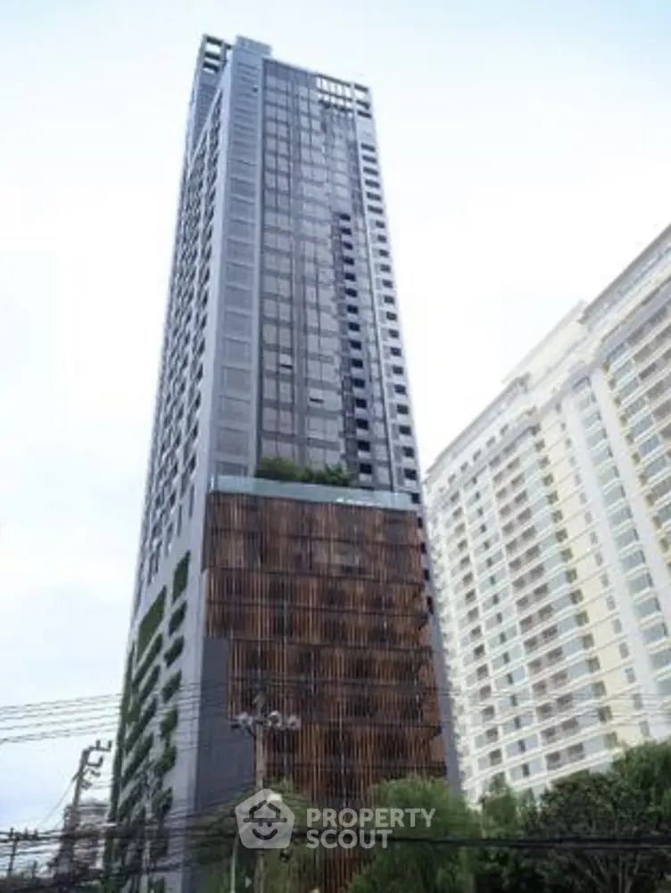 Modern high-rise building with sleek design and urban appeal