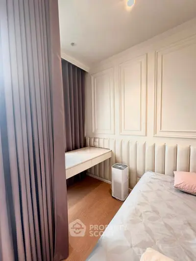 Cozy bedroom with elegant paneling and soft lighting, featuring a stylish bed and modern air purifier.