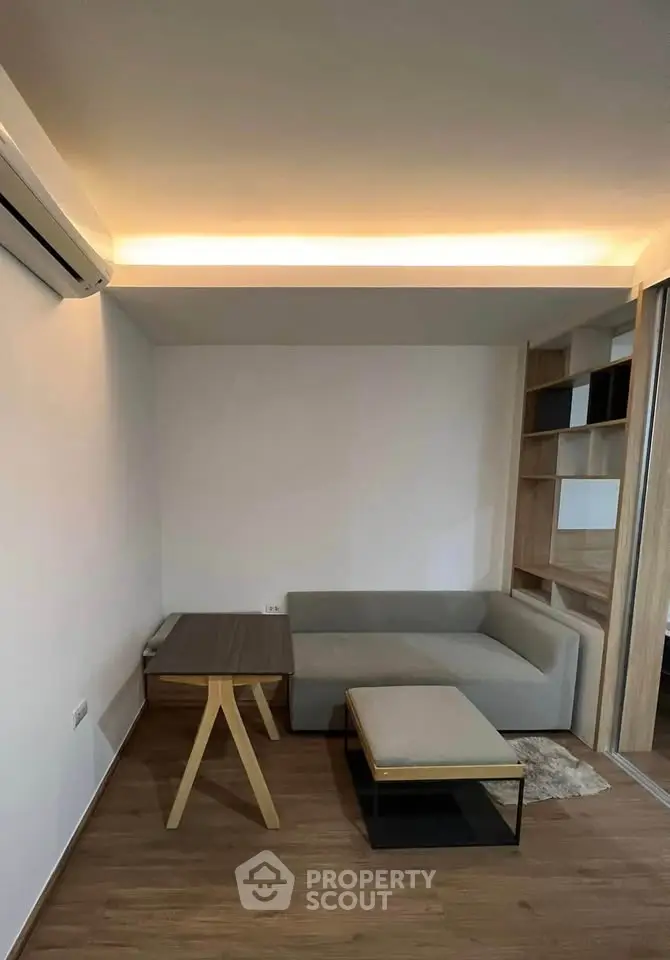 Modern living room with sleek furniture and ambient lighting