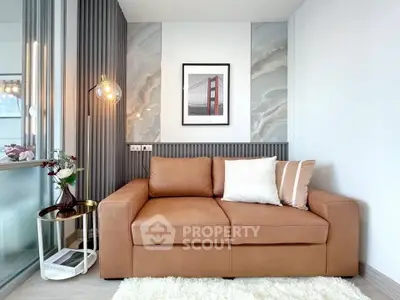Stylish modern living room with leather sofa and elegant decor