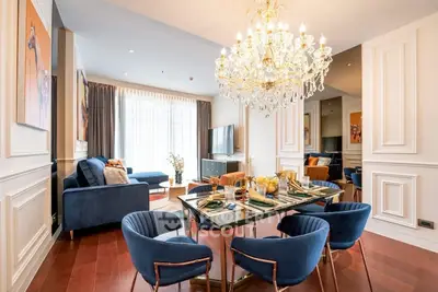 Luxurious living room with elegant chandelier and modern decor