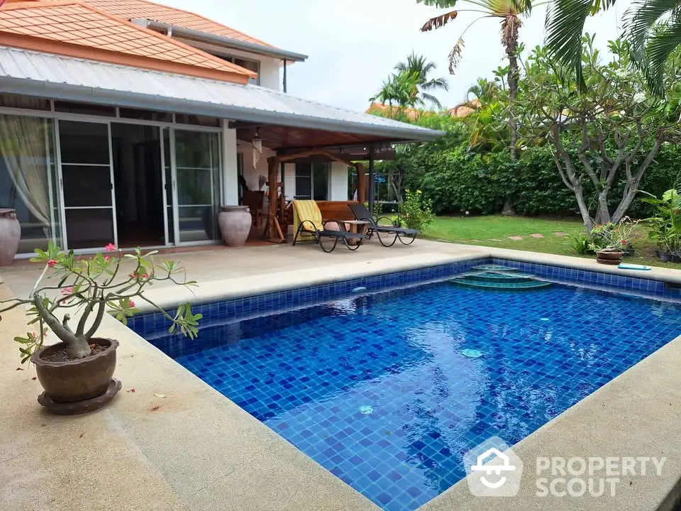 Charming villa with private pool and lush garden, perfect for relaxation and entertaining.