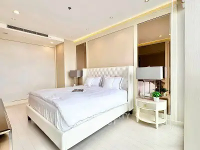 Luxurious bedroom with elegant decor and plush bedding in modern apartment